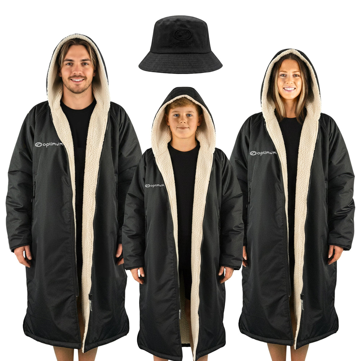 Three models in black Optimum Dry Wrap robes, cream fleece-lined hoods, black bucket hat, white background - Optimum