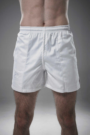 Man wearing white Optimum Auckland rugby shorts front-on with tonal logo on leg, grey background - Optimum