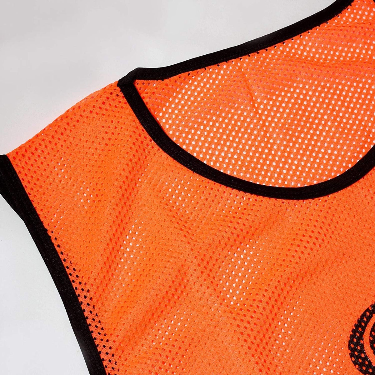 Close-up of orange Optimum mesh training bib neckline with black trim on white - Optimum